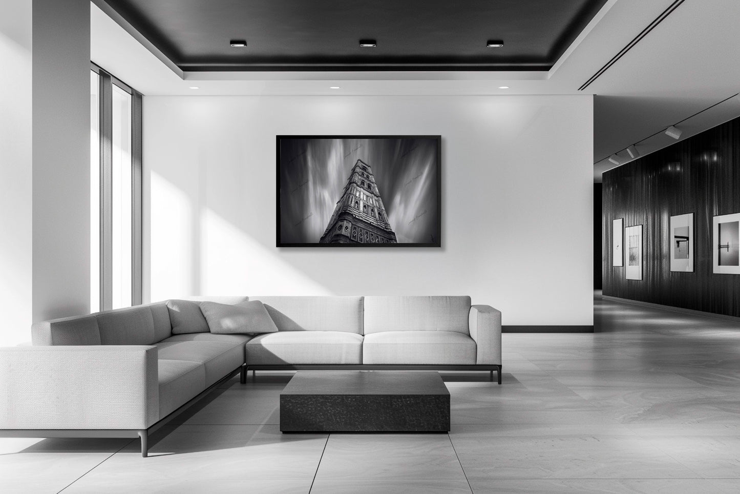 Fotografia fine art in bianco e nero incorniciata del Campanile di Giotto a Firenze con lunga esposizione, esposta in ambiente domestico moderno con arredamento minimalista.
Black and white fine art photograph shown framed of Giotto's Bell Tower in Florence with long exposure, displayed in modern home interior with minimalist furnishings.
